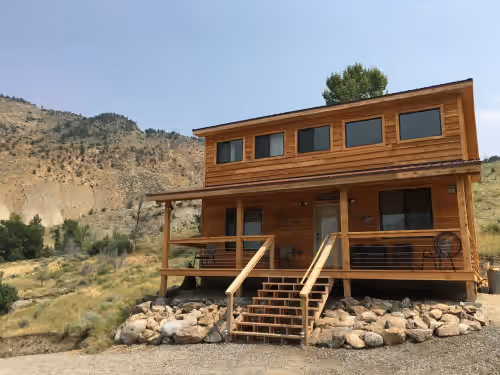 Reserve 2, 3 or all 4 cabins on this 13 acre horse ranch.5 mins from YNP!